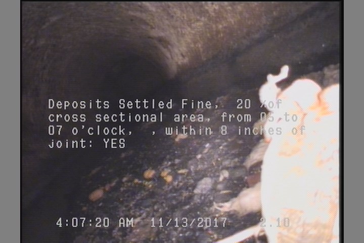 Deposits Settled Fine, 20 %of cross sectional area, from 05 to 07 o'clock, , within 8 inches of joint: YES