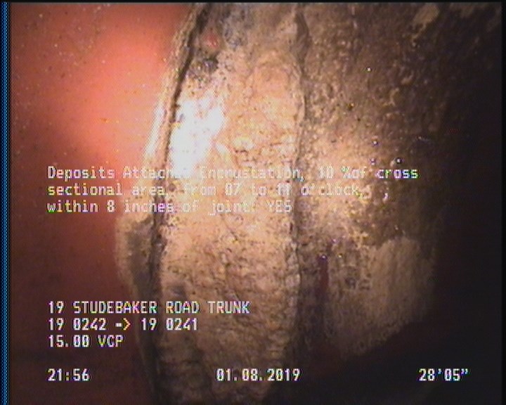 Deposits Attached Encrustation, 10 %of cross sectional area, from 07 to 11 o'clock, , within 8 inches of joint: YES