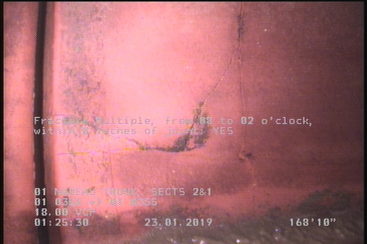 Fracture Multiple, from 08 to 02 o'clock, within 8 inches of joint: YES