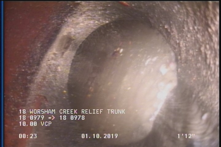 Deposits Attached Grease, 5 %of cross sectional area, from 03 to 09 o'clock, , within 8 inches of joint: YES