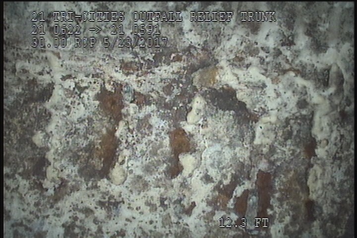 Surface Reinforcement Visible, from 11 to 01 o'clock, within 8 inches of joint: NO - CIRCUM REBAR POSSIBLE UNDER MAG COAT