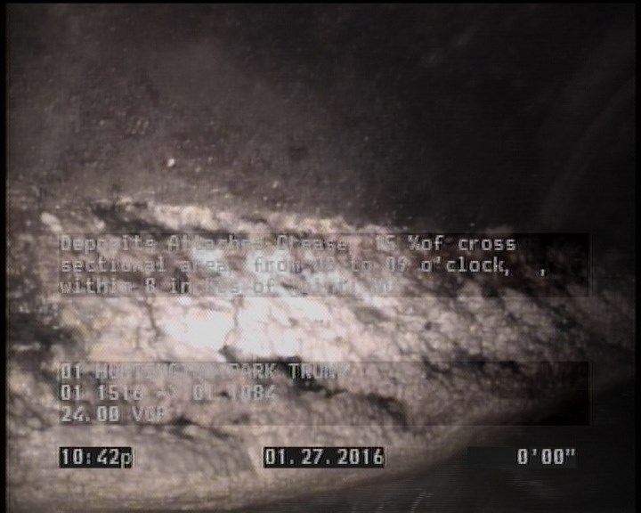 Deposits Attached Grease, 15 %of cross sectional area, from 08 to 09 o'clock, , within 8 inches of joint: NO