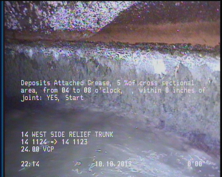 Deposits Attached Grease, 5 %of cross sectional area, from 04 to 08 o'clock, , within 8 inches of joint: YES