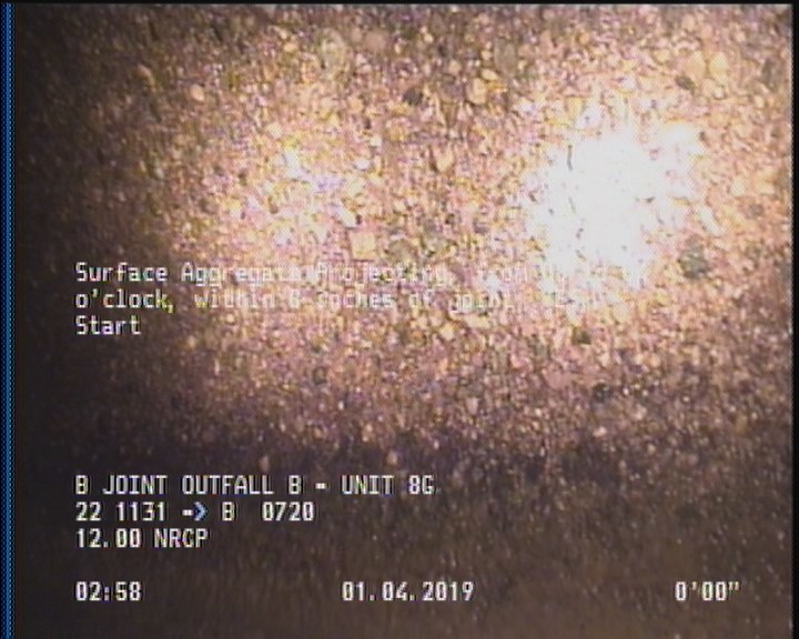 Surface Aggregate Projecting, from 08 to 04 o'clock, within 8 inches of joint: YES, Start