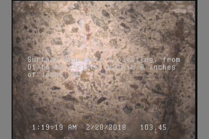 Surface Aggregate Projecting, from 01 to 04 o'clock, within 8 inches of joint: NO