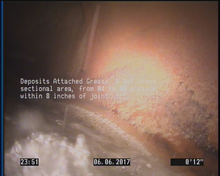 Deposits Attached Grease, 5 %of cross sectional area, from 04 to 08 o'clock, , within 8 inches of joint: YES