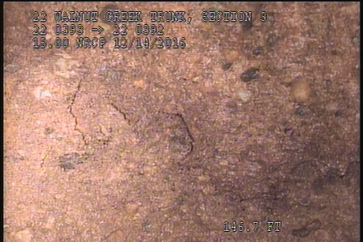 Surface Spalling, from 09 to 03 o'clock, within 8 inches of joint: YES - FLAKING CONCRETE