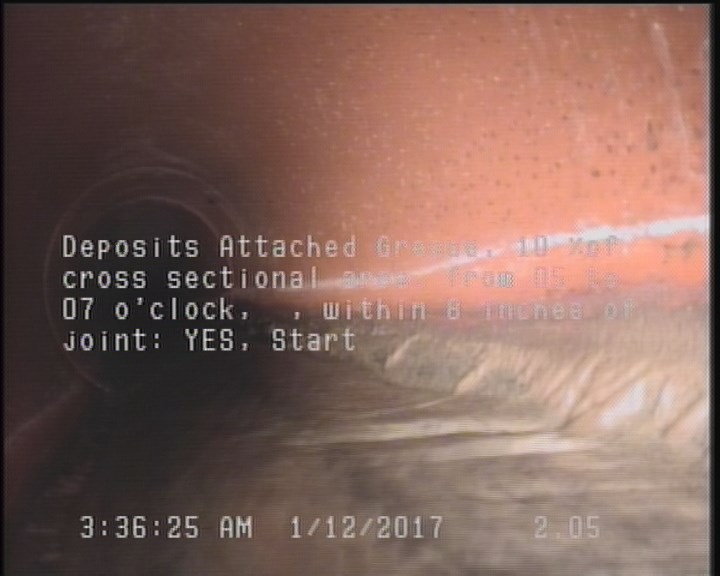 Deposits Attached Grease, 10 %of cross sectional area, from 05 to 07 o'clock, , within 8 inches of joint: YES, Start