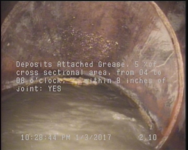 Deposits Attached Grease, 5 %of cross sectional area, from 04 to 08 o'clock, , within 8 inches of joint: YES
