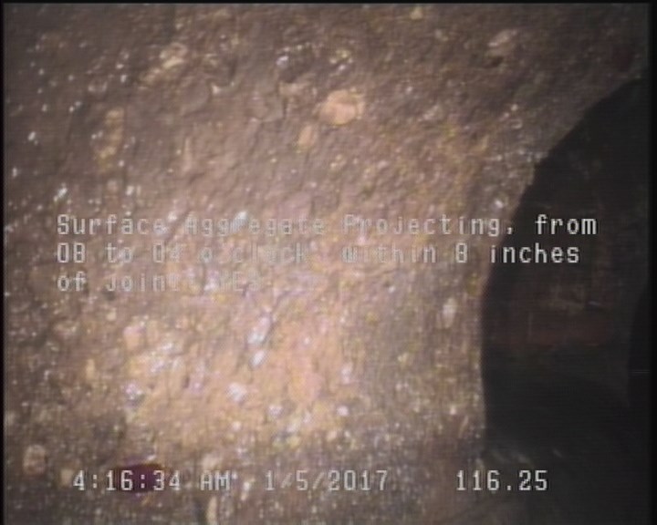 Surface Aggregate Projecting, from 08 to 04 o'clock, within 8 inches of joint: YES