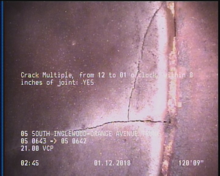 Crack Multiple, from 12 to 01 o'clock, within 8 inches of joint: YES