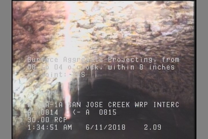 Surface Aggregate Projecting, from 08 to 04 o'clock, within 8 inches of joint: YES
