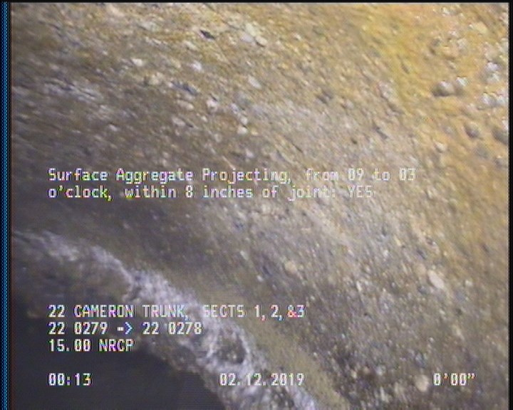 Surface Aggregate Projecting, from 09 to 03 o'clock, within 8 inches of joint: YES