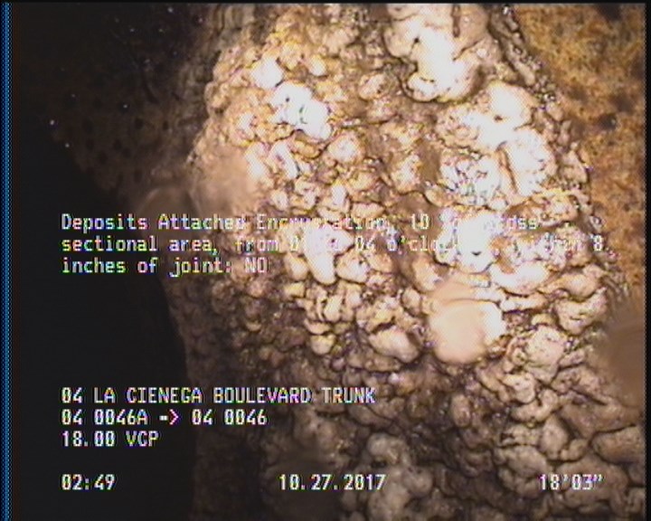 Deposits Attached Encrustation, 10 %of cross sectional area, from 01 to 04 o'clock, , within 8 inches of joint: NO