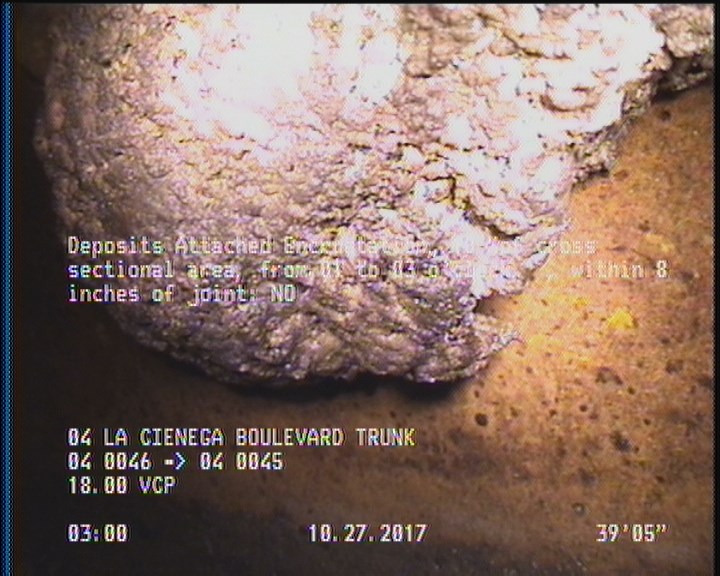 Deposits Attached Encrustation, 10 %of cross sectional area, from 01 to 03 o'clock, , within 8 inches of joint: NO