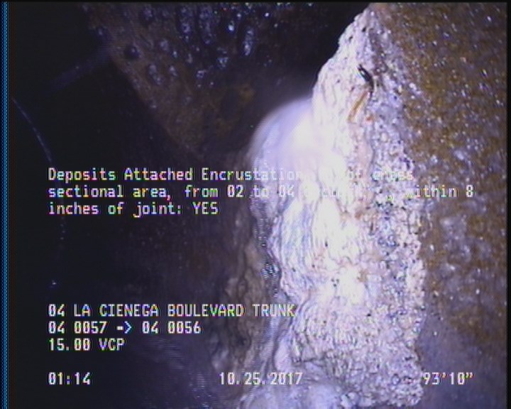 Deposits Attached Encrustation, 5 %of cross sectional area, from 02 to 04 o'clock, , within 8 inches of joint: YES