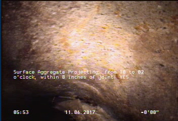 Surface Aggregate Projecting, from 10 to 02 o'clock, within 8 inches of joint: YES