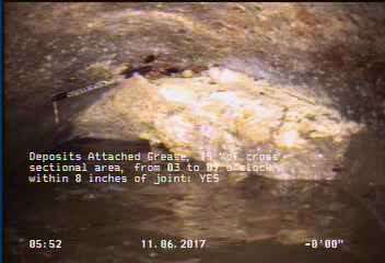 Deposits Attached Grease, 15 %of cross sectional area, from 03 to 09 o'clock, , within 8 inches of joint: YES