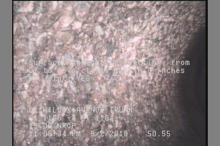 Surface Aggregate Projecting, from 07 to 05 o'clock, within 8 inches of joint: YES