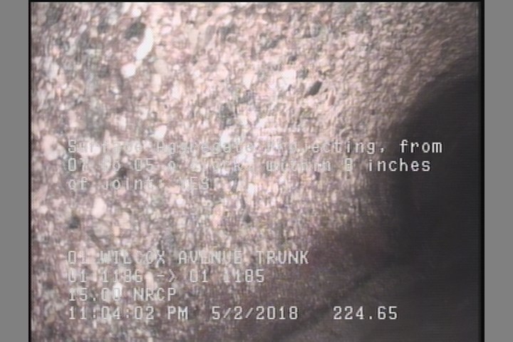 Surface Aggregate Projecting, from 07 to 05 o'clock, within 8 inches of joint: YES