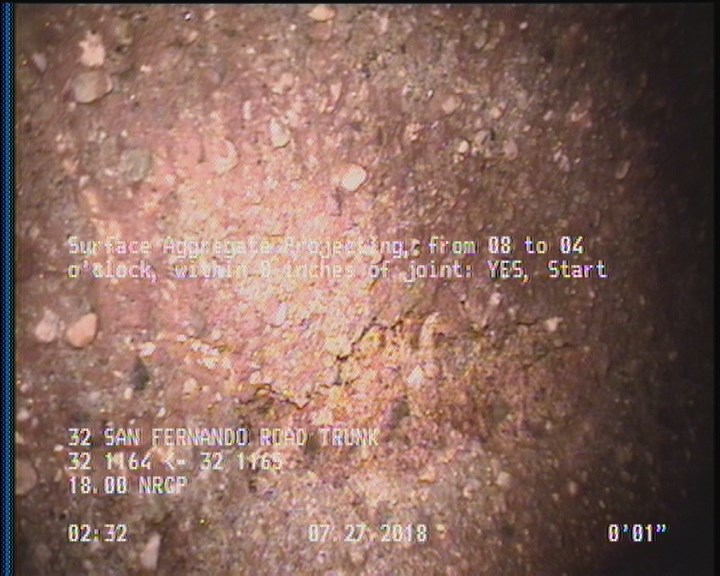 Surface Aggregate Projecting, from 08 to 04 o'clock, within 8 inches of joint: YES, Start