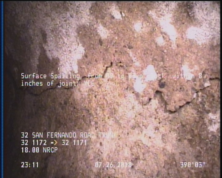 Surface Spalling, from 09 to 03 o'clock, within 8 inches of joint: YES