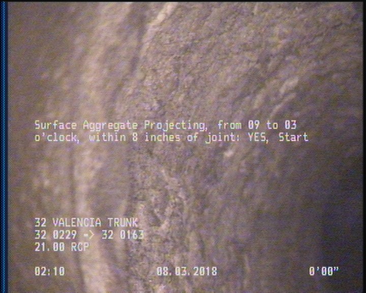 Surface Aggregate Projecting, from 09 to 03 o'clock, within 8 inches of joint: YES