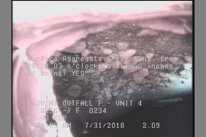 Surface Aggregate Projecting, from 09 to 03 o'clock, within 8 inches of joint: YES