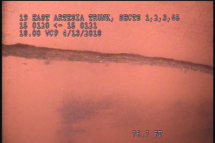 Broken, from 07 to 12 o'clock, within 8 inches of joint: YES