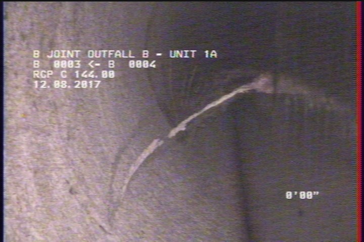Surface Reinforcement Corroded, from 11 to 01 o'clock, within 8 inches of joint: NO - BROKEN MISSING REBAR HANGING IN FLOW