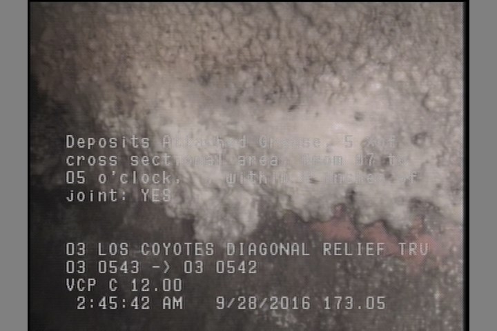 Deposits Attached Grease, 5 %of cross sectional area, from 07 to 05 o'clock, , within 8 inches of joint: YES