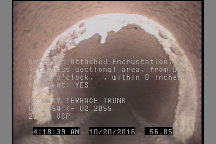 Deposits Attached Encrustation, 15 %of cross sectional area, from 08 to 04 o'clock, , within 8 inches of joint: YES