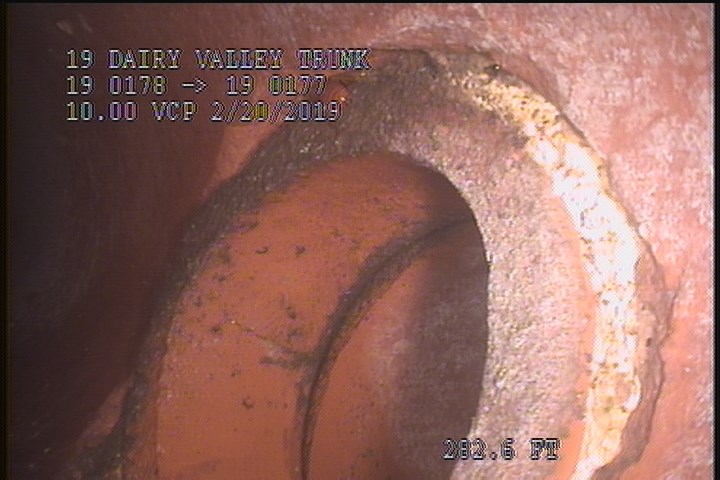 Tap Break-In Active, at 02 o'clock, -, within 8 inches of joint: YES, 6"