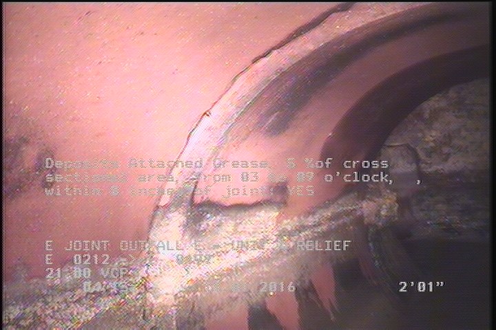 Deposits Attached Grease, 5 %of cross sectional area, from 03 to 09 o'clock, , within 8 inches of joint: YES