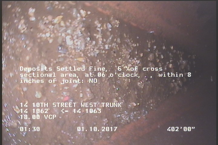 Deposits Settled Fine, 5 %of cross sectional area, at 06 o'clock, , within 8 inches of joint: NO