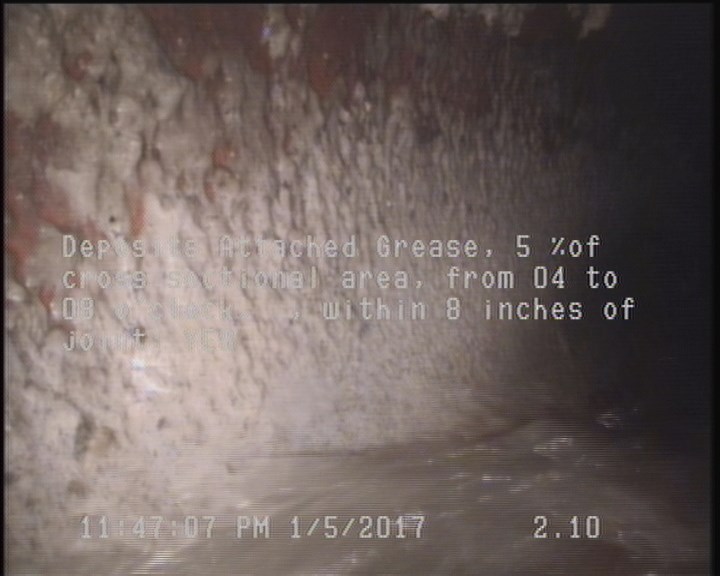 Deposits Attached Grease, 5 %of cross sectional area, from 04 to 08 o'clock, , within 8 inches of joint: YES