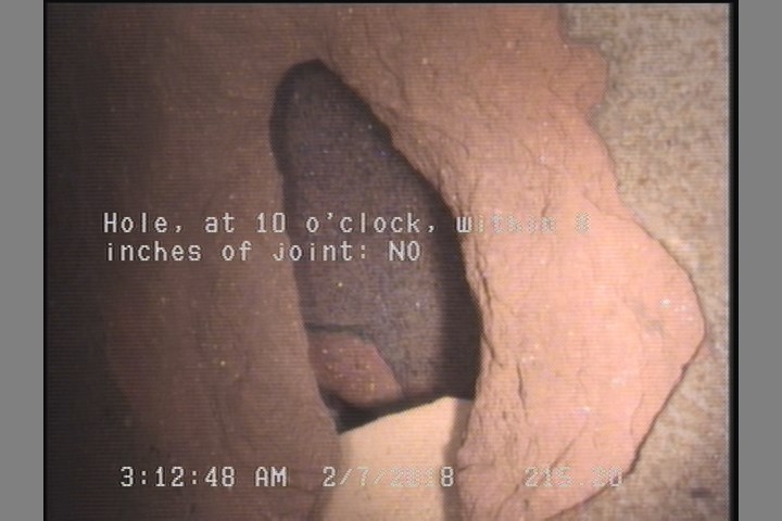 Hole, at 10 o'clock, within 8 inches of joint: NO