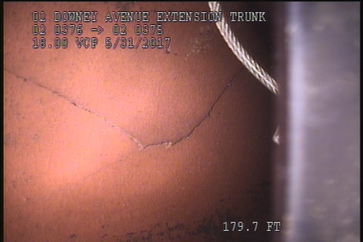 Broken, from 12 to 01 o'clock, within 8 inches of joint: NO - SLIGHT CIRCUM FRACTURE