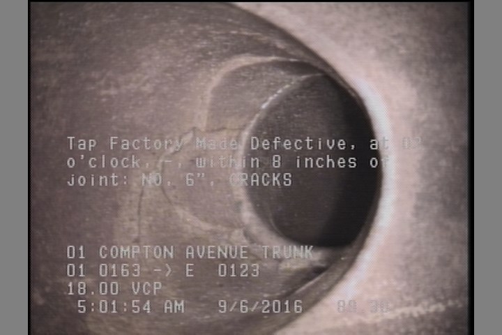 Tap Factory Made Defective, at 02 o'clock, -, within 8 inches of joint: NO, 6" - CRACKS