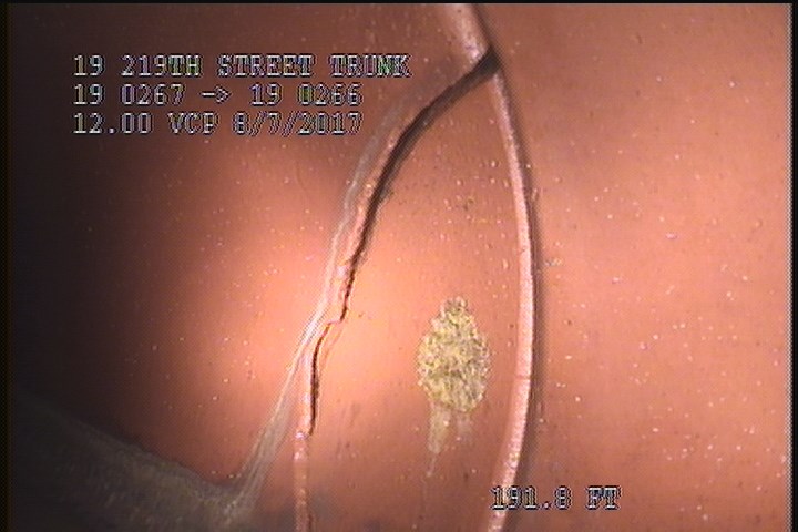 Broken, from 02 to 04 o'clock, within 8 inches of joint: YES