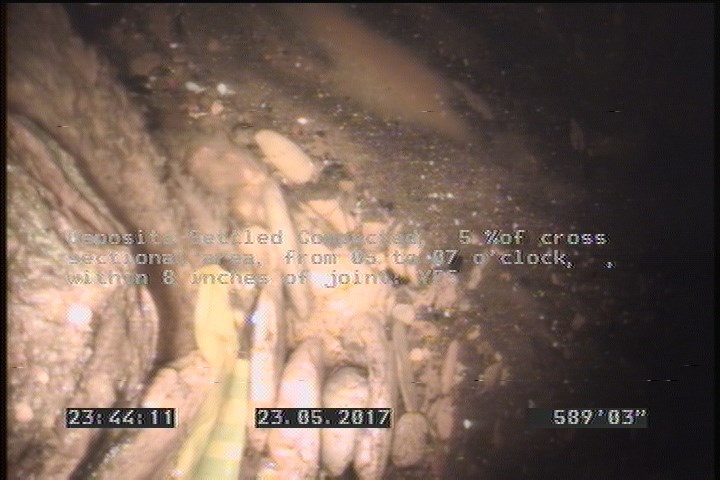 Deposits Settled Compacted, 5 %of cross sectional area, from 05 to 07 o'clock, , within 8 inches of joint: YES