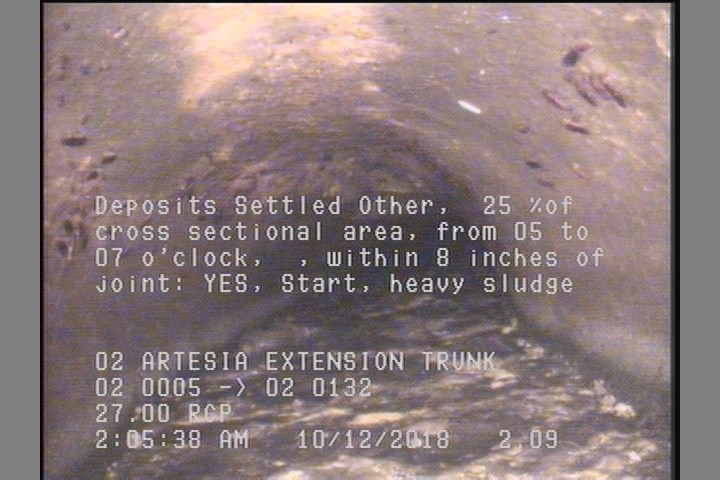 Deposits Settled Other, 25 %of cross sectional area, from 05 to 07 o'clock, , within 8 inches of joint: YES, Start - heavy sludge