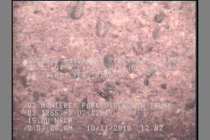 Surface Aggregate Projecting, from 08 to 04 o'clock, within 8 inches of joint: YES, Start