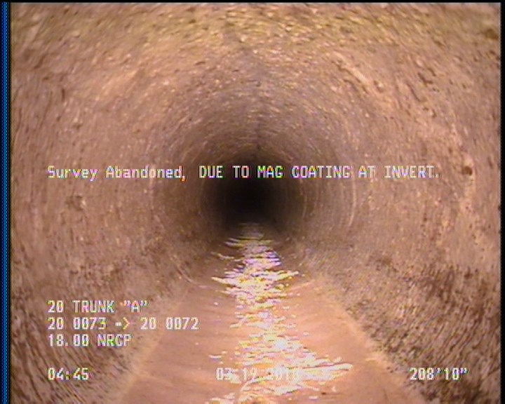 Survey Abandoned - DUE TO MAG COATING AT INVERT.