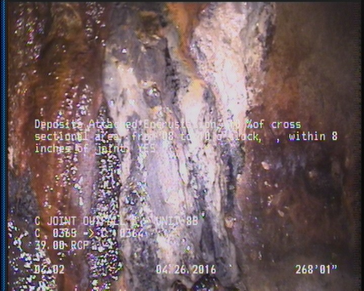 Deposits Attached Encrustation, 10 %of cross sectional area, from 08 to 10 o'clock, , within 8 inches of joint: YES