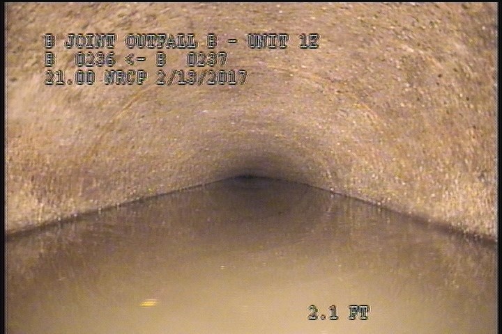 Downstream Manhole, Survey Begins - 1:04 PM