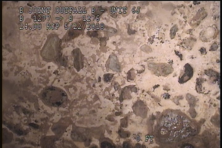 Surface Aggregate Projecting, from 09 to 03 o'clock, within 8 inches of joint: YES, Start - SEVERE AGG UNDER MAG COAT