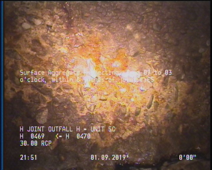 Surface Aggregate Projecting, from 09 to 03 o'clock, within 8 inches of joint: YES