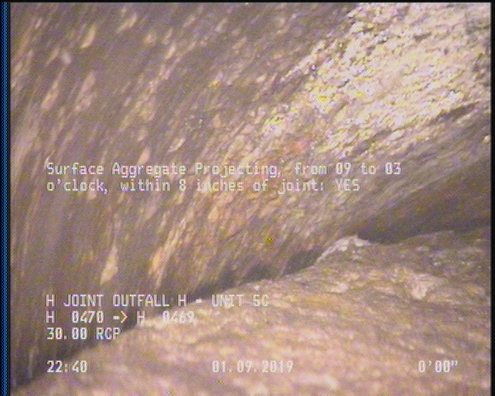 Surface Aggregate Projecting, from 09 to 03 o'clock, within 8 inches of joint: YES