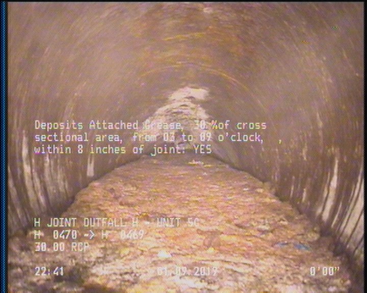 Deposits Attached Grease, 30 %of cross sectional area, from 03 to 09 o'clock, , within 8 inches of joint: YES